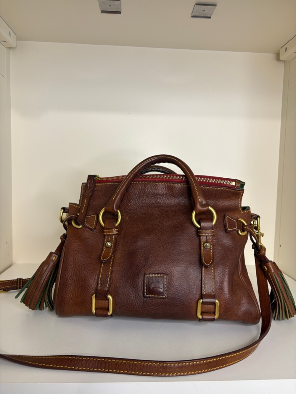 Dooney & Bourke Florentine Brown Leather Satchel with Tassel Accents